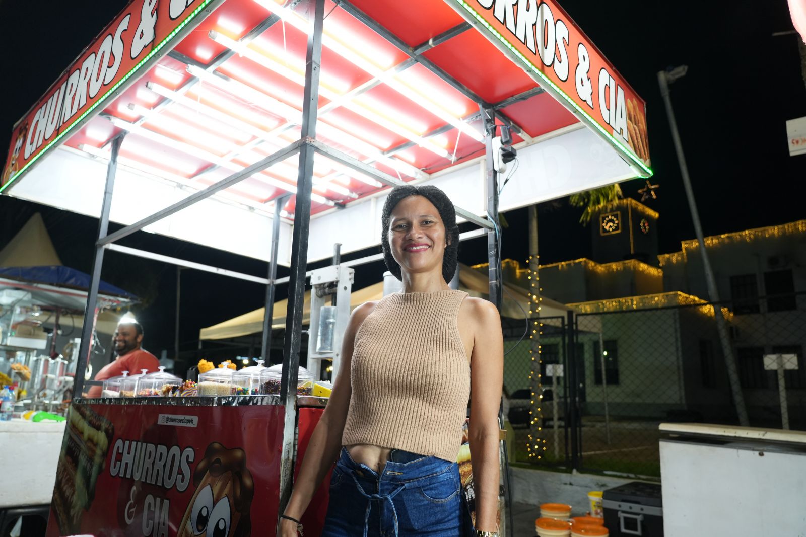 A vendedora de churros Eleonora Carvalho reforça a importância do evento para quem vive do comércio informal.